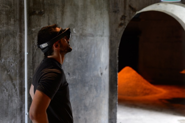 Guests enjoying the VR headsets at the Atelier Aitken and ArchitectureNow biotechnology in architecture exhibition at Silo 6, Wynyard Quarter.