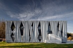 An apartment block with walls made of curtains